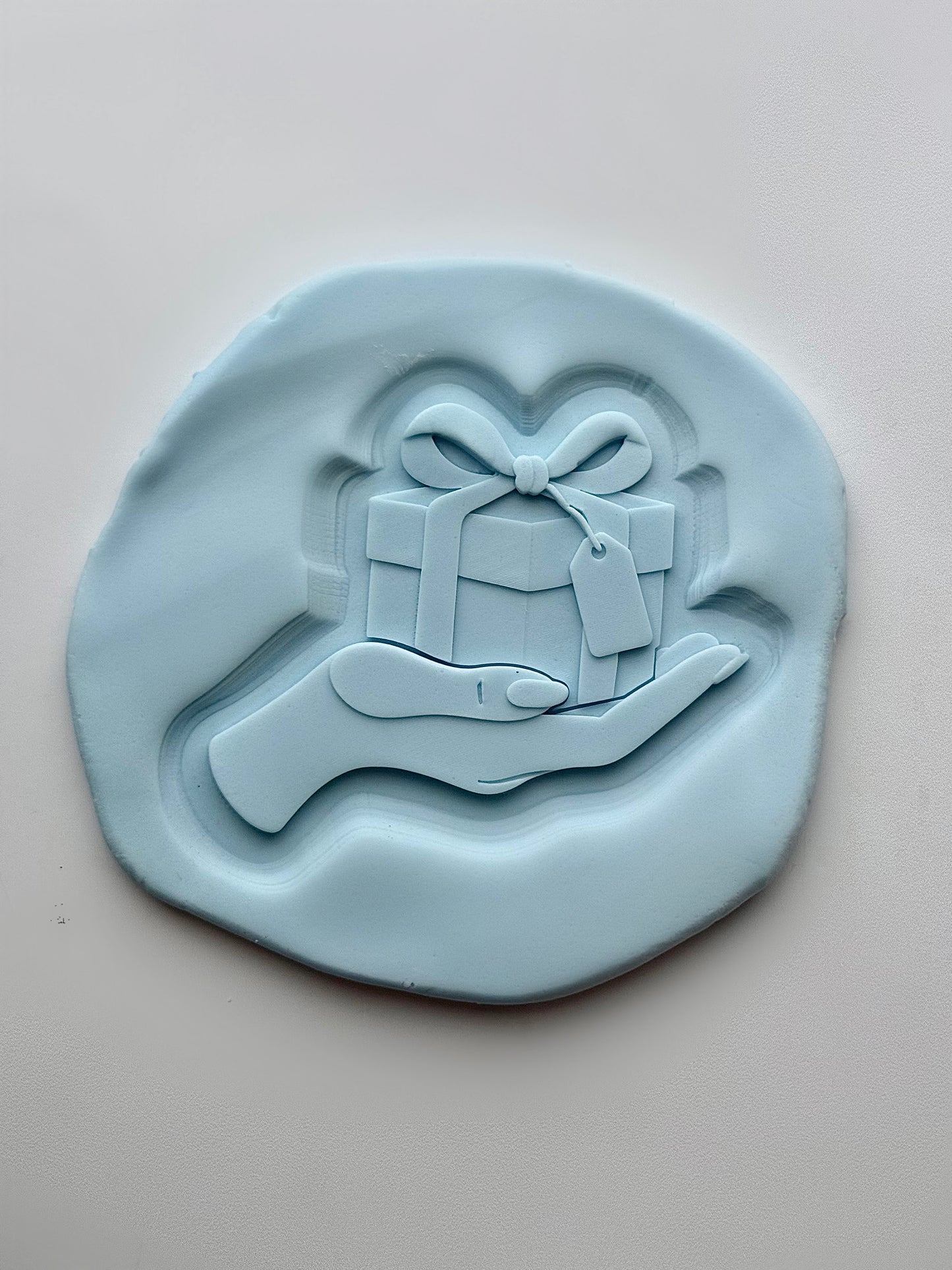 Hand Holding Gift (with tag)