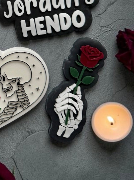 Skeleton Hand Holding Rose