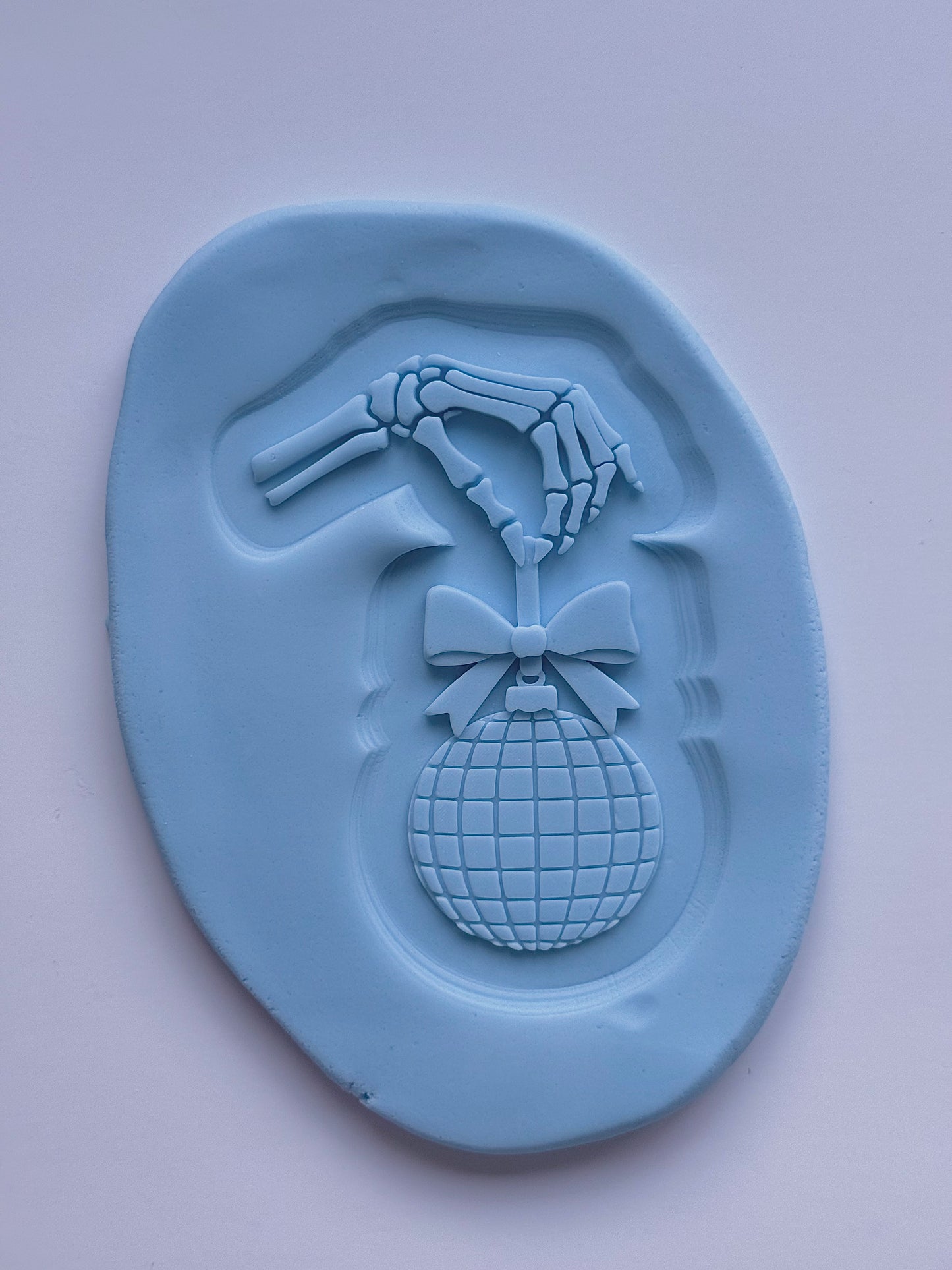 Skeleton holding Discoball