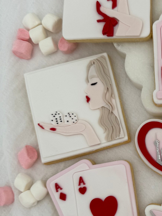 Girl Blowing Dice