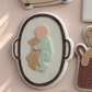 Baby in Basket with Bear
