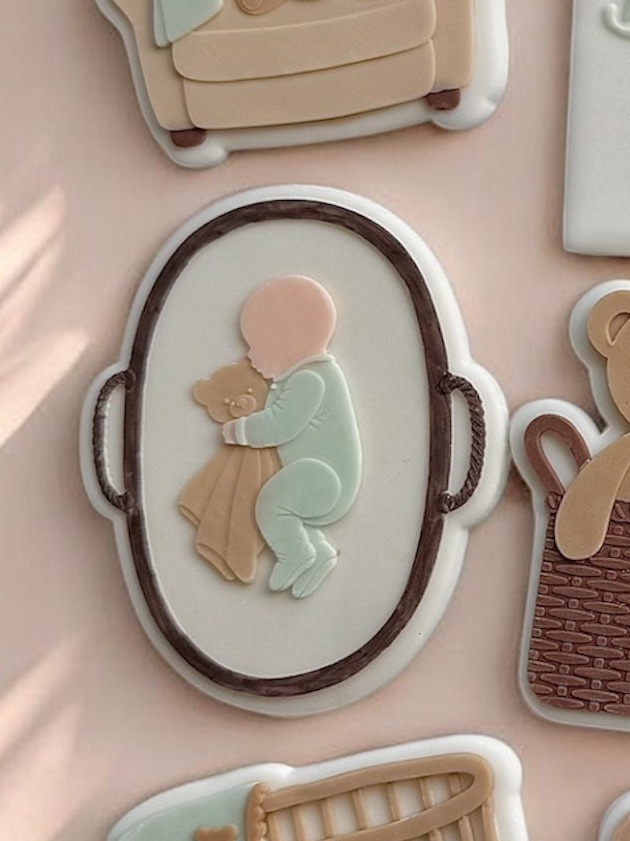 Baby in Basket with Bear