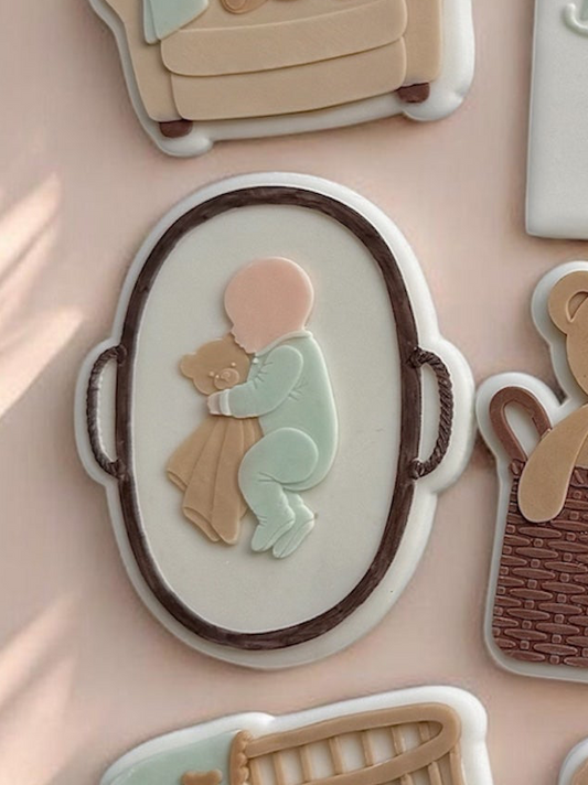 Baby in Basket with Bear